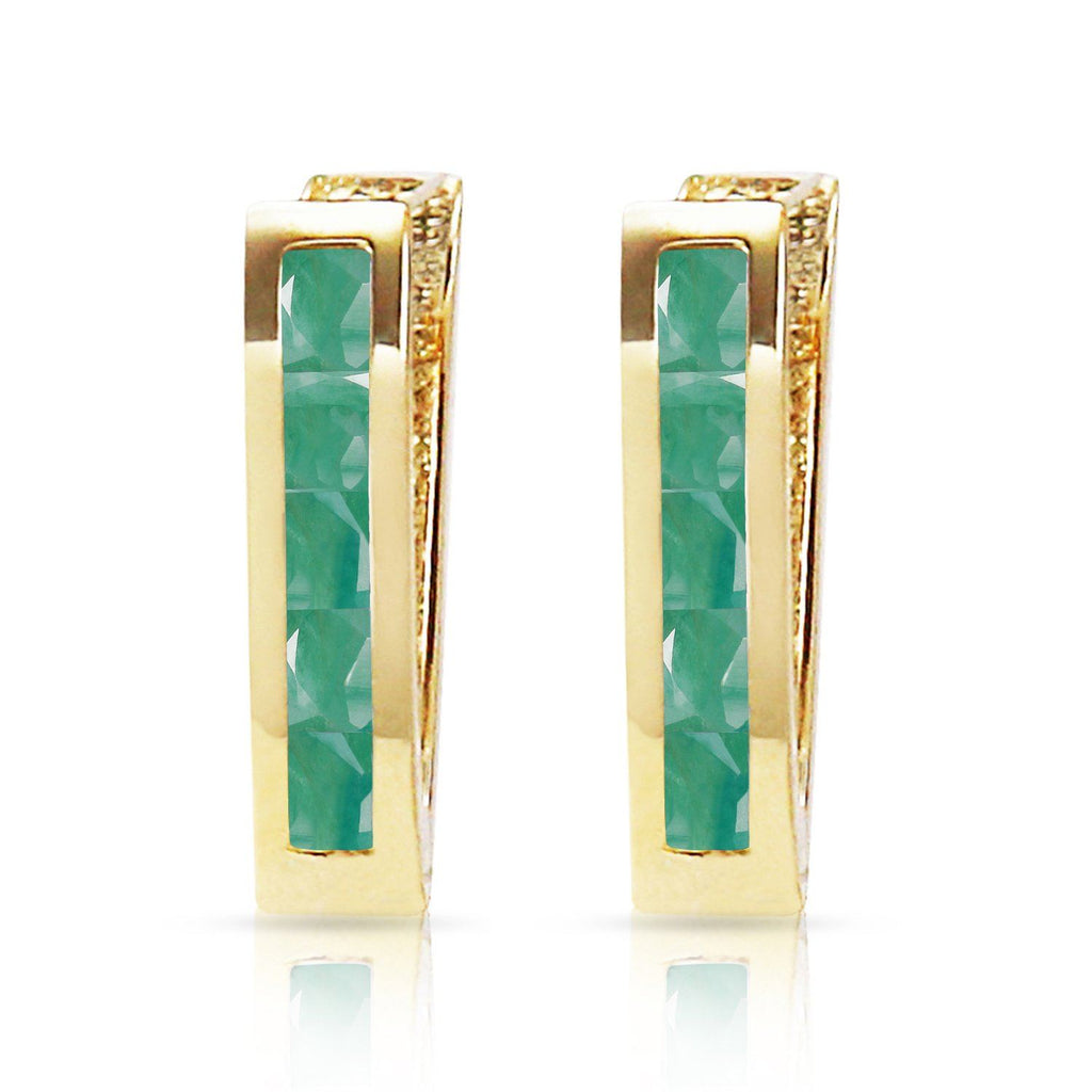 14K. Gold Oval Huggie Earrings w/ Emeralds
